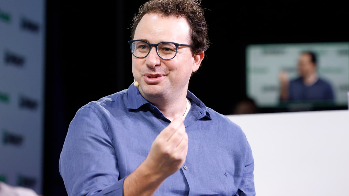 Anthropic chief executive Dario Amodei speaking on stage at TechCrunch Disrupt in 2023