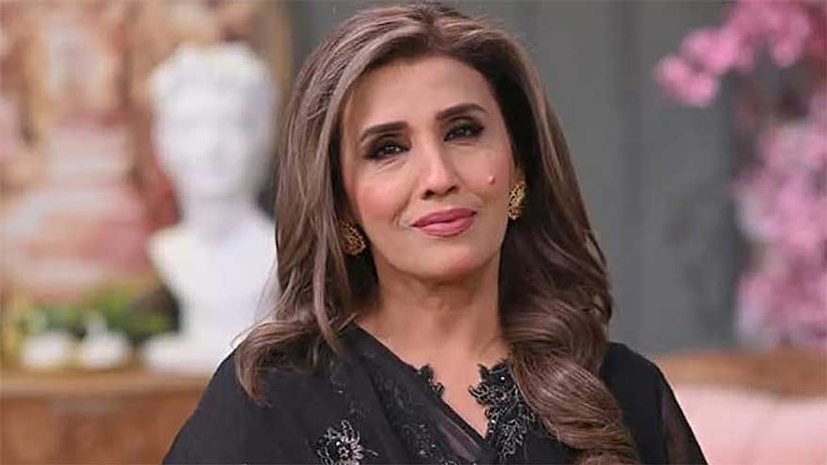 Singer Humaira Channa in a black outfit, smiling at the camera