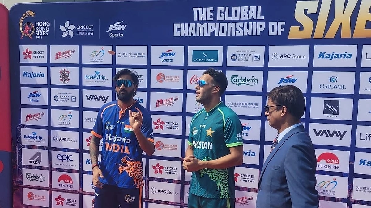 India and Pakistan captains at the toss in front of a Hong Kong Sixes 2026 sponsor board, with a match official beside them
