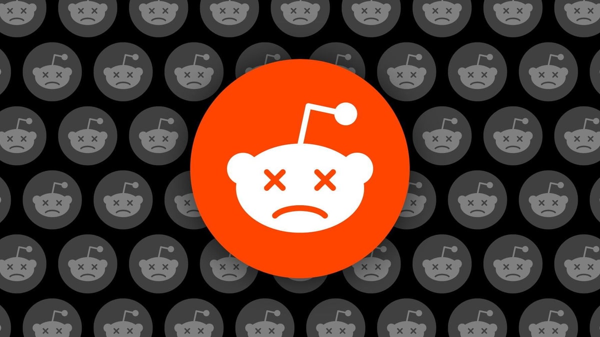 Illustration of the Reddit logo with a sad face, surrounded by grey copies