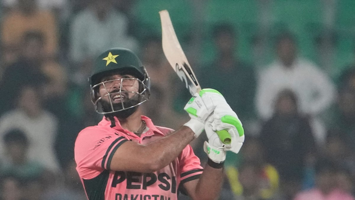 A Pakistan batter in the pink kit plays a shot against England at the Gaddafi Stadium in Lahore